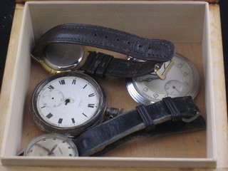 A carved wooden box containing 2 pocket watches and 2 wristwatches