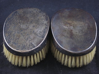 A pair of silver backed military hairbrushes, Birmingham 1918