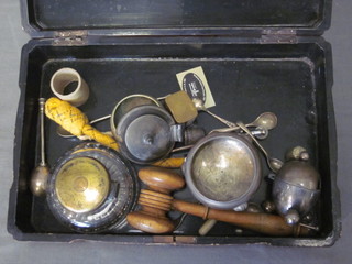 An Eastern lacquered box with hinged lid containing a turned wooden gavel and other curios