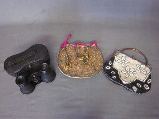 A pair of opera glasses and 2 lady's evening bags