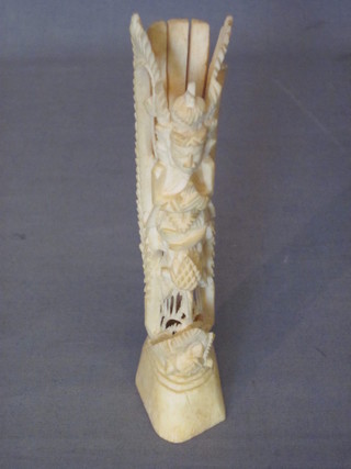 A carved section of ivory 6"