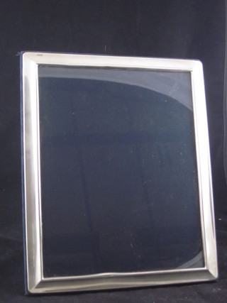A modern silver easel photograph frame 11 1/2" x 9"