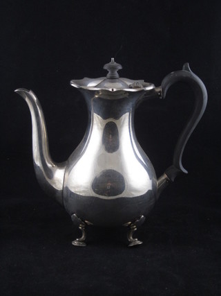 A silver plated coffee pot