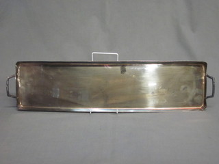 A rectangular silver plated twin handled porter's tray 22"
