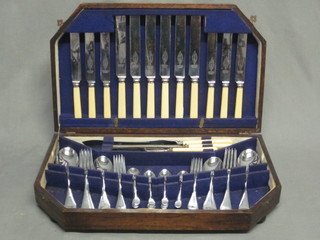 A canteen of chromium plated Old English pattern flatware contained in an oak canteen box