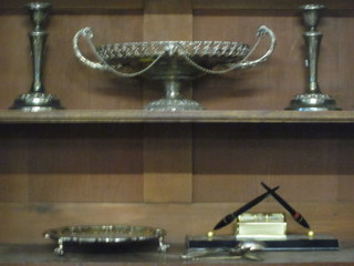 A pair of silver plated candlesticks, an oval pierced twin handled dish, a silver plated salver, teaspoons etc