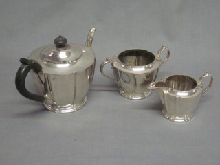 A 3 piece silver plated tea service comprising teapot, twin  handled sugar bowl and milk jug