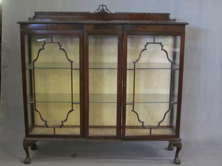 A Chippendale style mahogany breakfront display cabinet, fitted shelves enclosed by astragal glazed doors, raised on cabriole  supports 53"