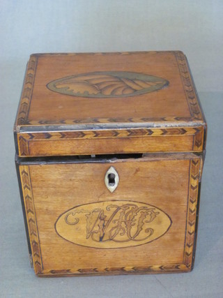 A square Georgian mahogany tea caddy with inlaid decoration  and hinged lid, monogrammed to the front with ivory escutcheon,  4", some beading missing  ILLUSTRATED