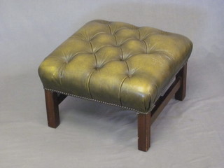 A square mahogany stool, the seat upholstered in green leather,  raised on an H framed stretcher 23"