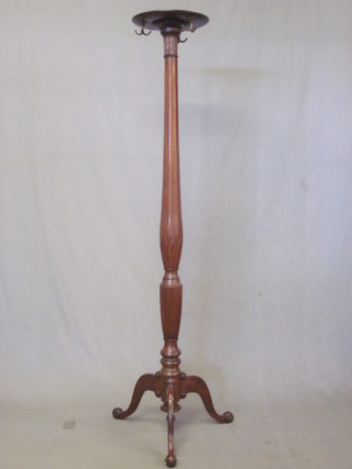 A 19th Century inlaid mahogany torchere raised on turned and  fluted column with tripod base, converted for use as a hat and  coat stand