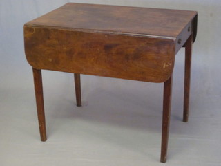 A Georgian mahogany Pembroke table fitted a drawer and raised  on square supports 32"