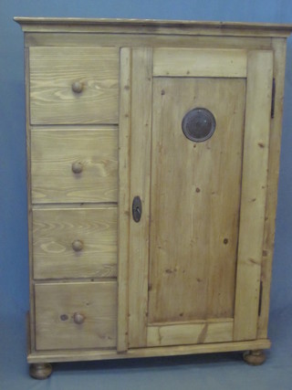 A pine combination wardrobe fitted 4 drawers to the side with cupboard 382"