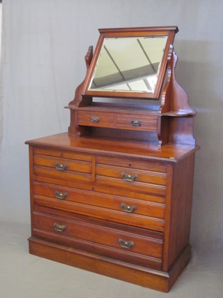 A Victorian walnut dressing chest with mirror above 2 glove drawers, 2 short and 2 long drawers, raised on a platform base  42"