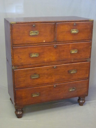 A 19th Century mahogany Military chest with brass fittings, the upper section fitted 2 short and 1 long drawer, the base fitted 2  long drawers, raised on bun feet 36"  ILLUSTRATED