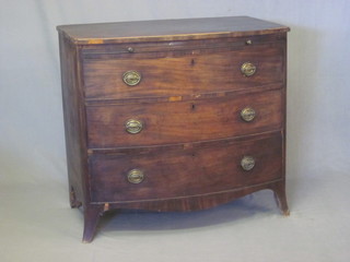 A Georgian mahogany bow front chest fitted a brushing slide  above 3 long drawers, raised on bracket feet 37 1/2"   ILLUSTRATED