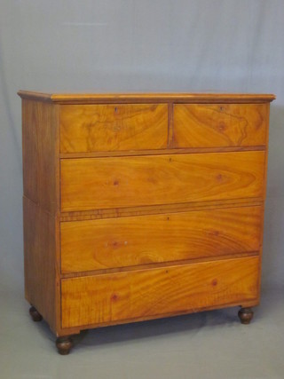 A 19th Century camphor Military chest, the upper section fitted 2 short and 1 long drawer, the base fitted 2 long drawers, raised on  turned supports 44"