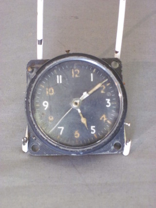 An aircraft clock with Arabic numerals, the reverse marked AM  with 2 1/2" dial