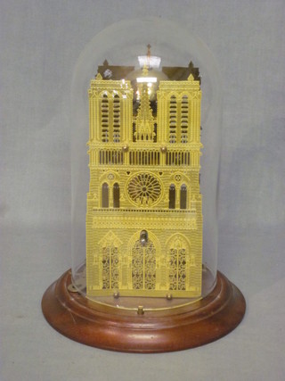 A reproduction skeleton clock in the form of a cathedral complete with dome 11"