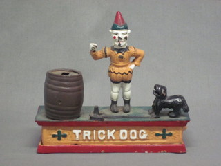 A reproduction iron moneybox Trick Dog 8"