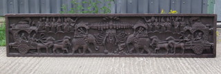 A large section of Eastern carved wooden panelling depicting Deity, elephants, warriors and attendants 17" x 84"