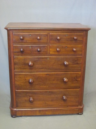 A Victorian mahogany D shaped chest of 4 short and 3 long  drawers with tore handles, raised on a platform base 36"  ILLUSTRATED