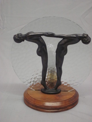 An Art Deco style metal table lamp in the form of 2 standing  naked figures, the reverse marked L & L WMC 8"