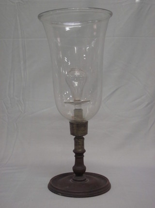 A Victorian lace makers glass lantern, raised on a turned base  17"
