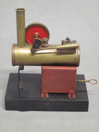 A child's brass stationery steam engine