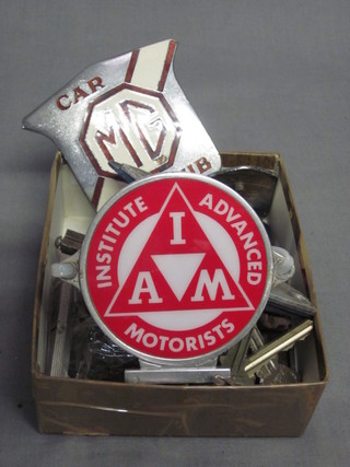 3 AA beehive radiator badges, 2 square badges, an MG club  badge, a Veteran Motorist badge, an IAM badge and a Morris  van badge