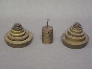 A collection of 8 various brass graduated weights 2lb, 1lb, 8 ozs, 4 ozs, 2 ozs, 1oz, 1/2oz and 1/4oz, together with 7 graduated  brass weights - mostly Avery and a set of 9 various weights by  Cusson of Manchester