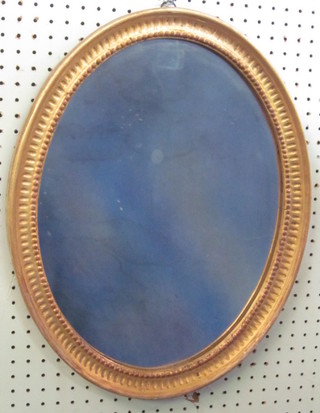 A 19th Century oval bevelled plate wall mirror contained in a gilt  frame 19"