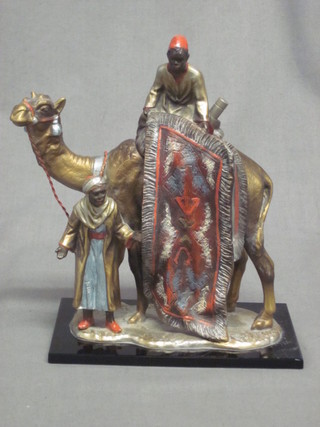 An Austrian painted spelter table lighter of The Rug Salesman,  8"  ILLUSTRATED