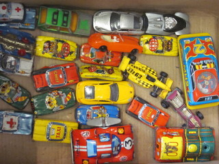 A collection of tin plate model cars