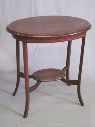An Edwardian oval inlaid 2 tier mahogany occasional table 26"