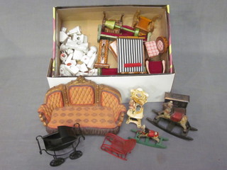 A small collection of dolls house furniture contained in 2 shoe boxes