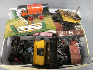A Hornby Type 40 clockwork tank engine, 1 other Hornby tank engine - f, a small collection of rolling stock and rails