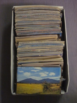 A quantity of various postcards