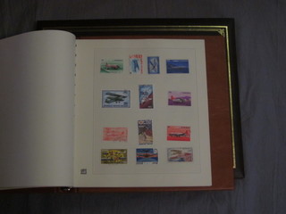 2 albums of stamps - motor cars and aircraft