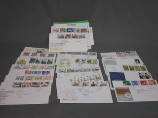 A collection of presentation stamps, first day covers etc