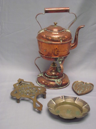 A circular copper spirit kettle complete with burner, a brass  trivet, an ashtray and a circular silver plated dish