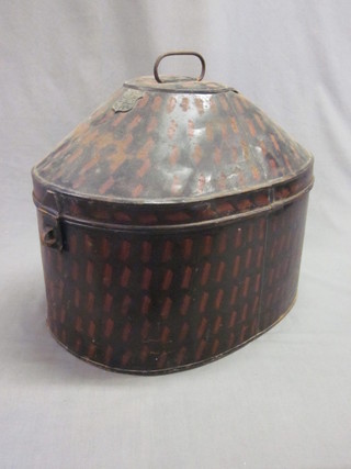 An oval metal hat box by Gieves