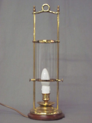 A table lamp in the form of a 19th Century candle lantern