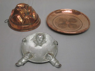 A cast aluminium ashtray depicting Pierrot, the reverse marked R  & A Main London Falkirk, 5", a circular planished dish 8" and a  jelly mould 6"
