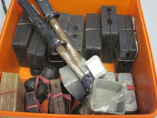A collection of lead soldier moulds