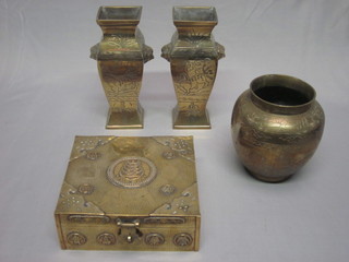 A rectangular Eastern brass trinket box with hinged lid decorated  a Pagoda 6 1/2", a circular engraved brass vase and a pair of club  shaped vases 7"
