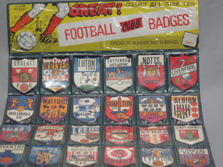 A collection of various football club paper badges