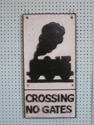 A reproduction cast iron level crossing railway sign 23" x 11"
