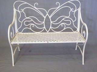 A white metal folding garden bench decorated butterflies 48"