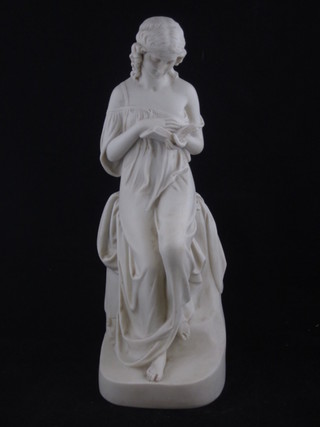 A Coalport Parian figure of a lady reading a book, the reverse impressed Ceramic & Crystal Palace Arts Union P Mac Dowell  Copeland, Sculpt. 1869 Copyright Reserved, 13" ILLUSTRATED